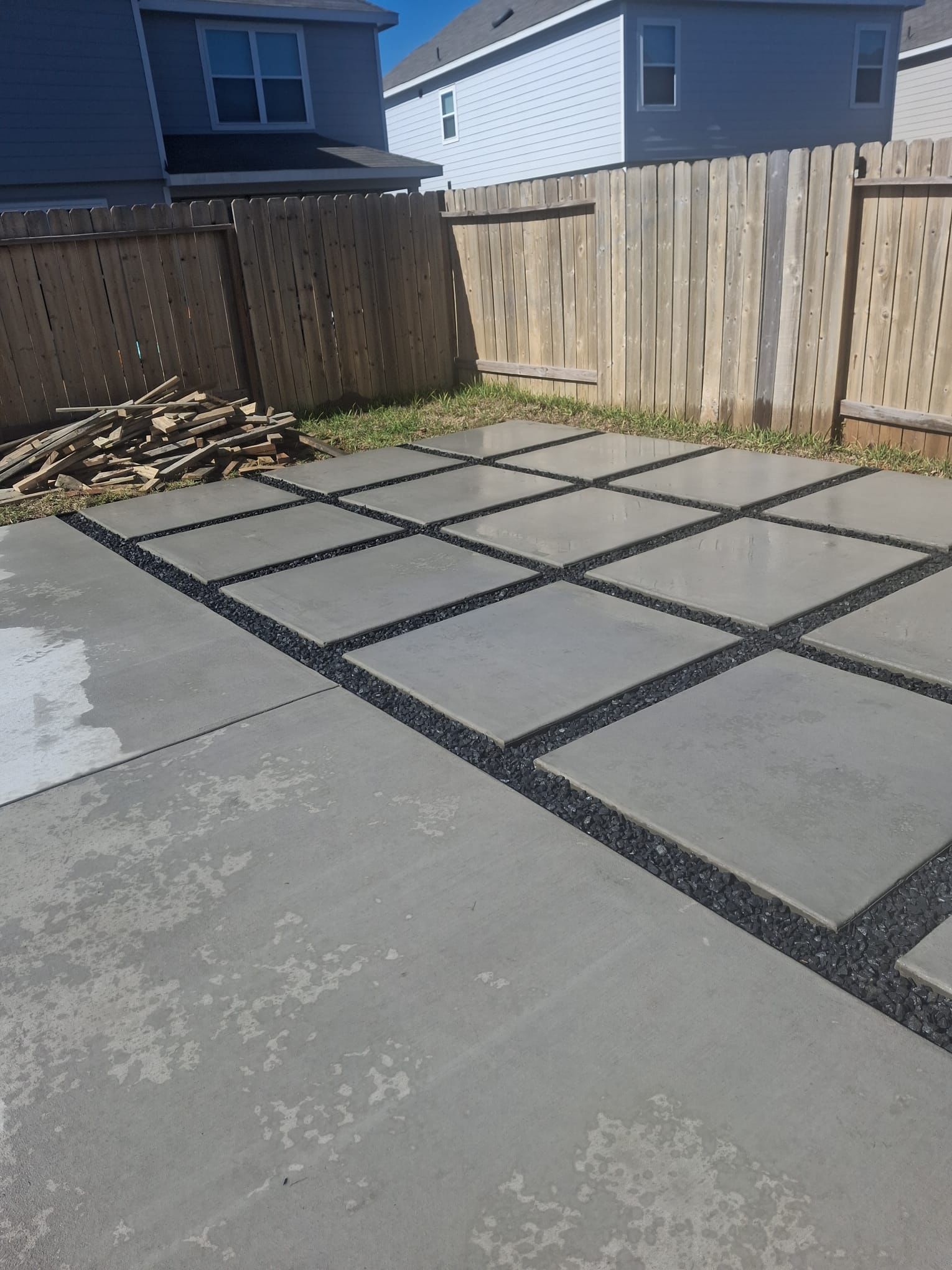 IMG-20250303-WA0104 concrete patio in backyard with fenced in yard