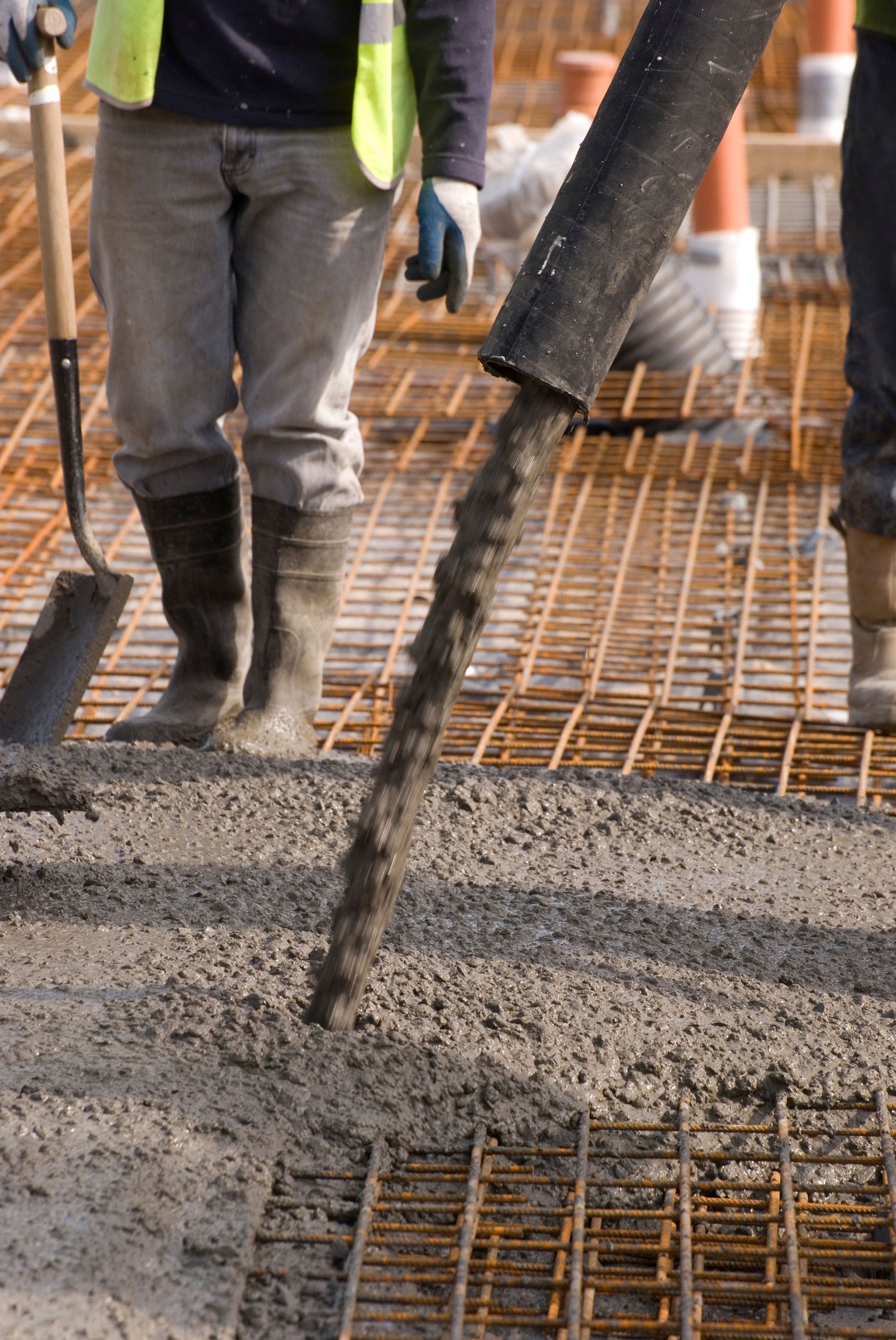 pouring-out-concrete pouring concrete at job site