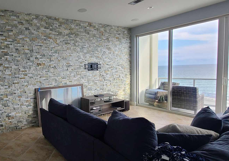 Contemporary room with stone accent wall