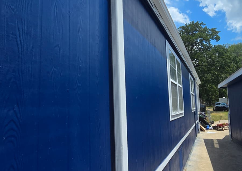 Blue building with white windows
