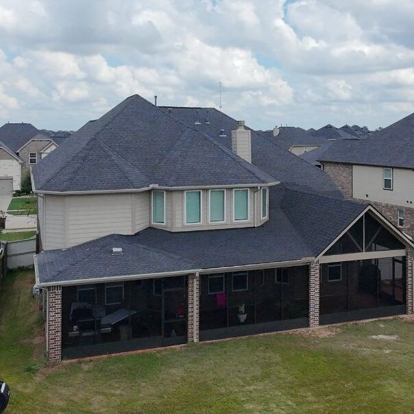 Two-story suburban house with backyard patio