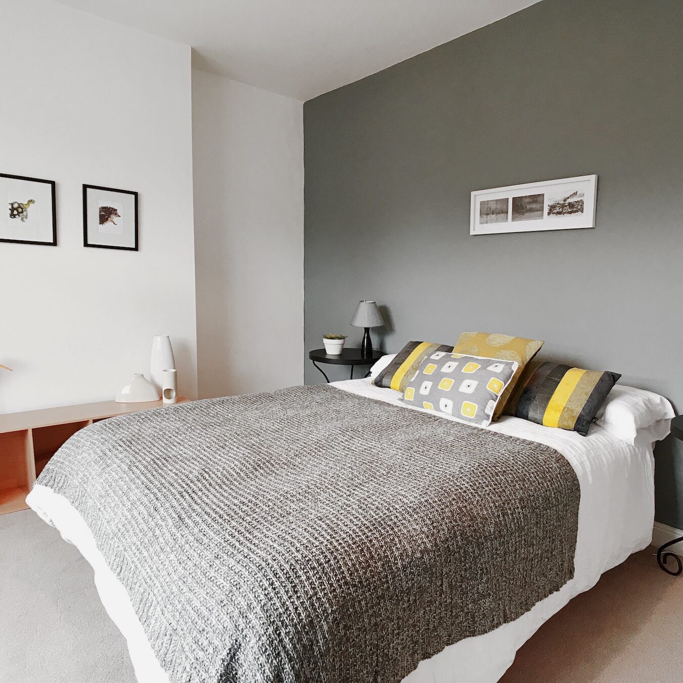 Modern bedroom with gray accent wall