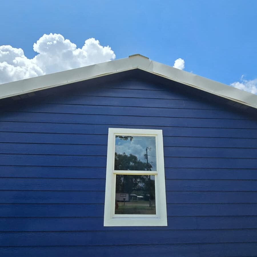 House with blue walls and white trim