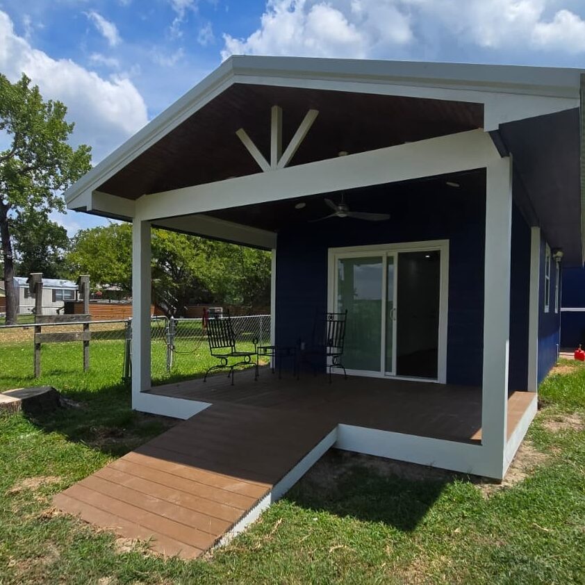 Small blue house with front porch